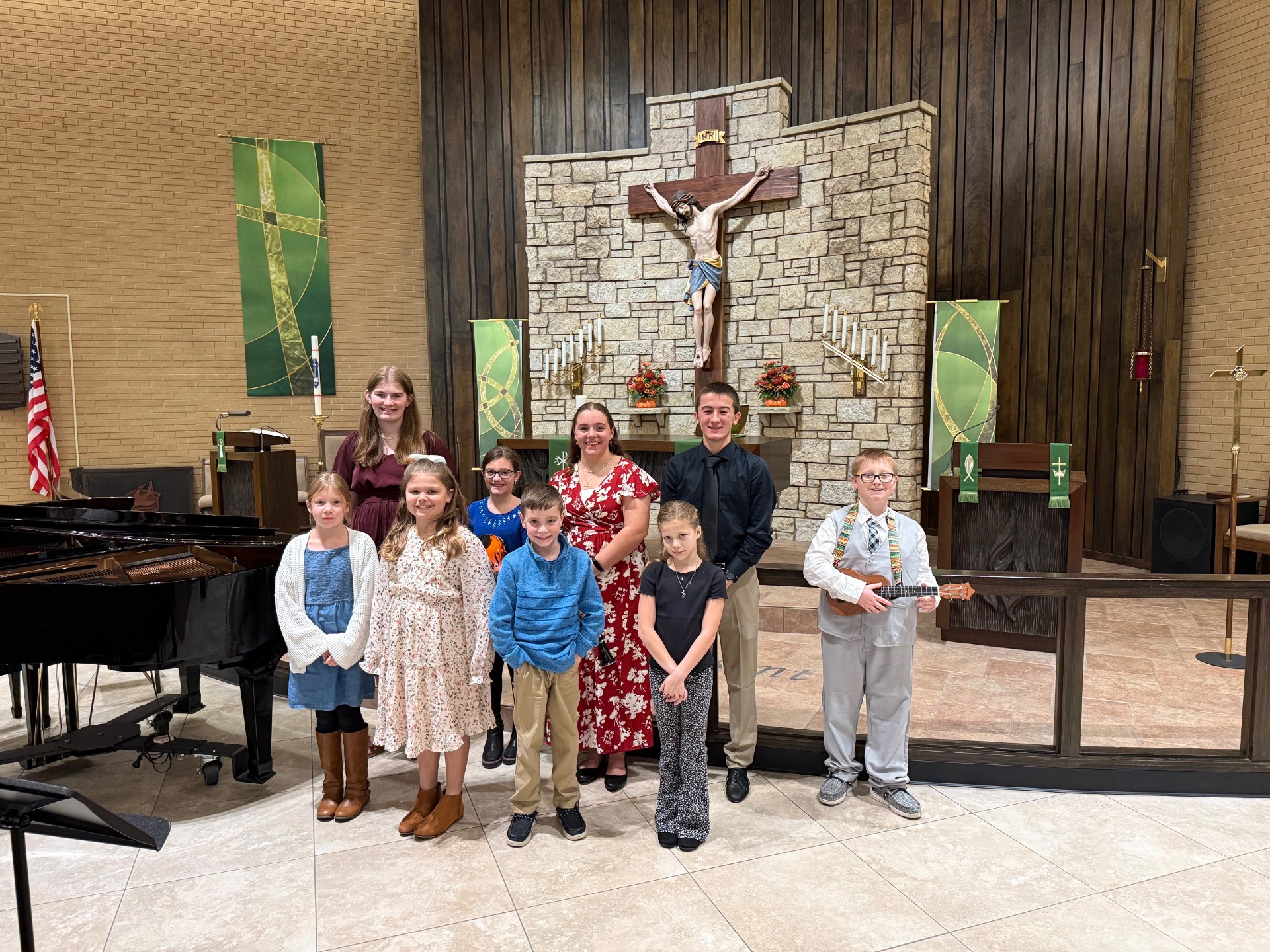 Piano and recorder duo performing in church